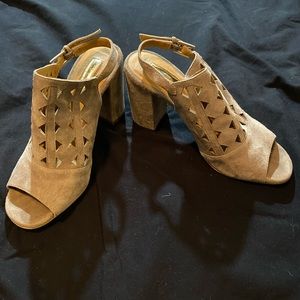 Block heels with cut outs and peep hole